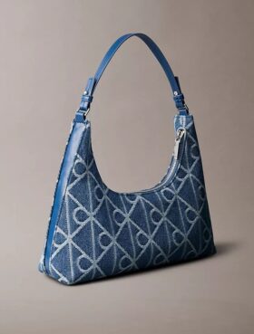 Sac à bandoulière en Denim avec logo emblématique sur toute la surface