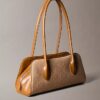 Sac à bandoulière en jacquard avec logo emblématique sur toute la surface