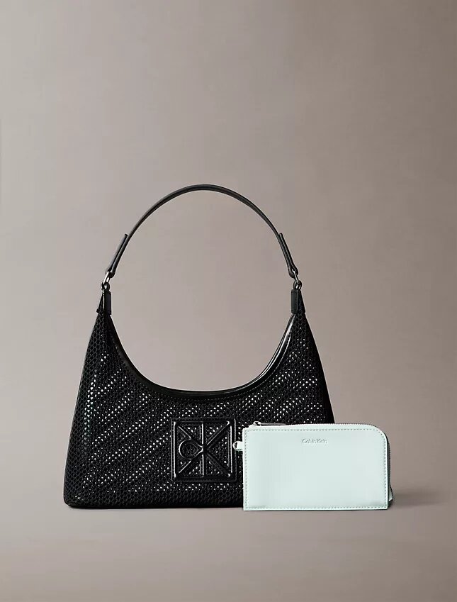 Sac à bandoulière en maille avec logo emblématique Sac à bandoulière en maille avec logo emblématique