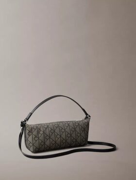 Sac à bandoulière en toile avec logo emblématique sur toute la surface