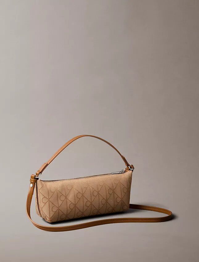 Sac à bandoulière en toile avec logo emblématique sur toute la surface Sac à bandoulière en toile avec logo emblématique sur toute la surface