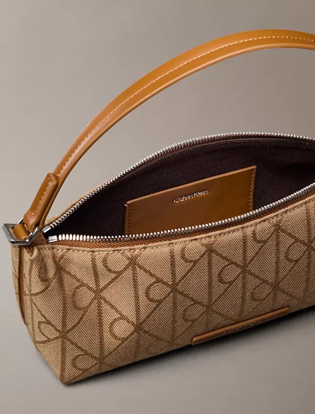 Sac à bandoulière en toile avec logo emblématique sur toute la surface Sac à bandoulière en toile avec logo emblématique sur toute la surface