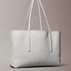 Sac fourre-tout avec logo emblématique sur toute la surface et pochette