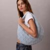 Sac hobo en Denim avec logo emblématique sur toute la surface Sac hobo en Denim avec logo emblématique sur toute la surface