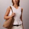 Sac seau en jacquard avec logo emblématique sur toute la surface et pochette Sac seau en jacquard avec logo emblématique sur toute la surface et pochette