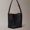 Sac seau en maille avec emblème Sac seau en maille avec emblème