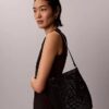 Sac seau en maille avec emblème Sac seau en maille avec emblème