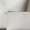 Sac seau à logo emblématique sur toute la surface avec pochette Sac seau à logo emblématique sur toute la surface avec pochette