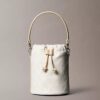 Sac seau à motif Monogram intégral Sac seau à motif Monogram intégral