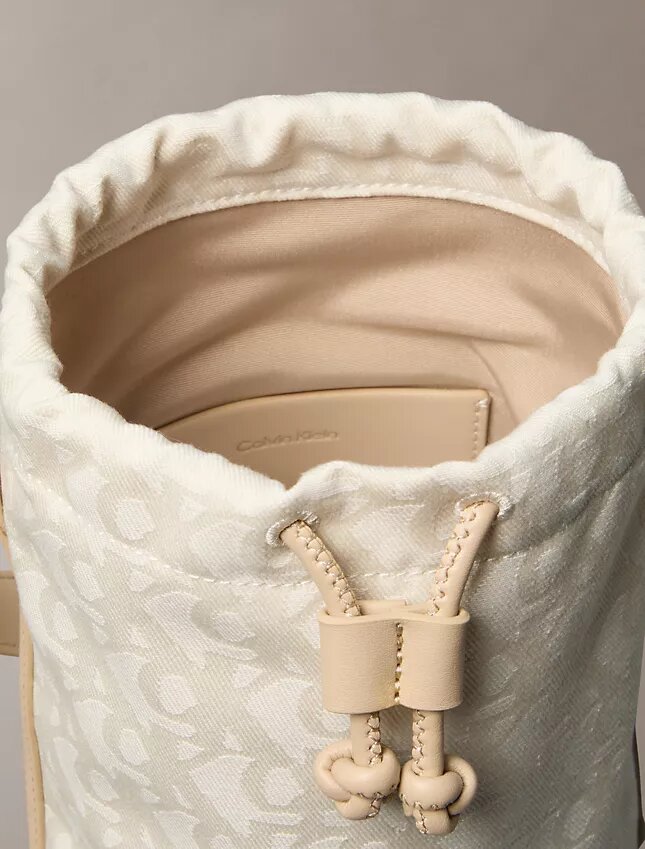 Sac seau à motif Monogram intégral Sac seau à motif Monogram intégral