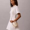 Sac seau à motif Monogram intégral Sac seau à motif Monogram intégral
