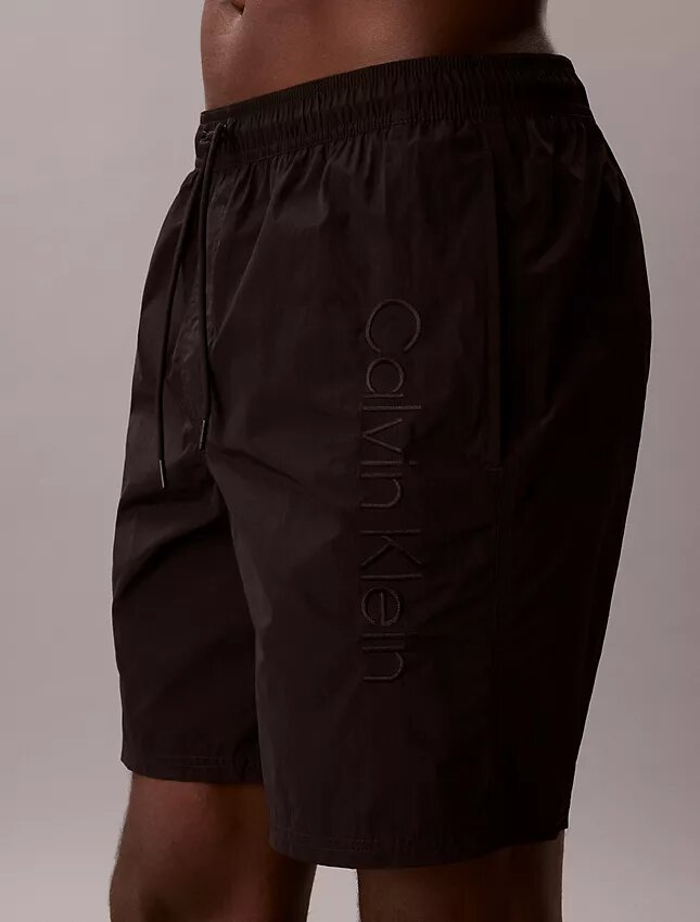 Short de bain avec logo graphique Short de bain avec logo graphique