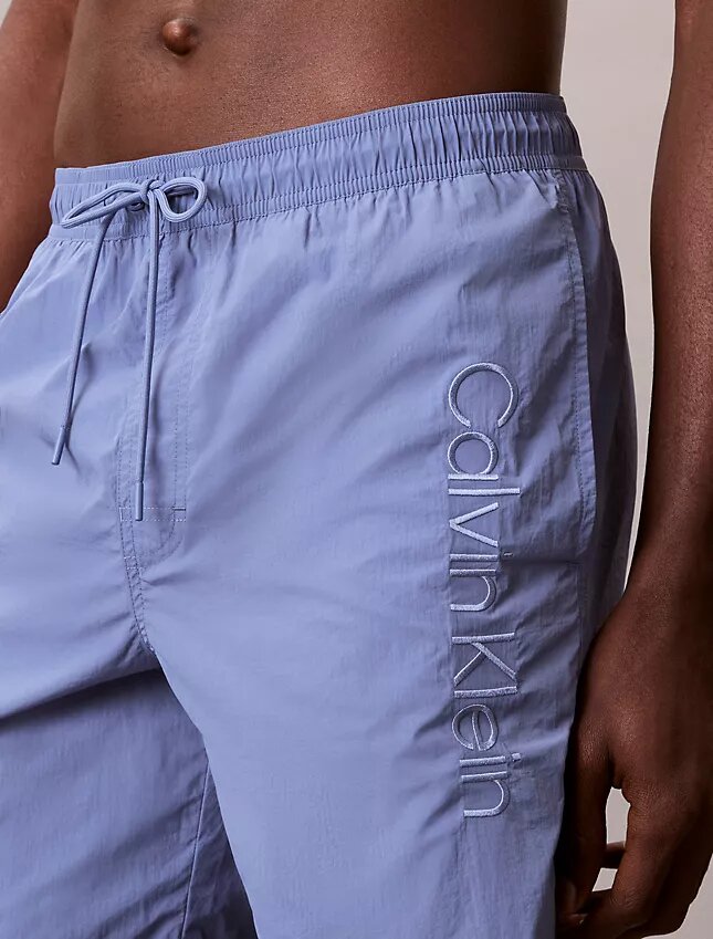 Short de bain avec logo graphique Short de bain avec logo graphique