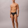 Slip taille basse en microfibre extensible avec motif Monogram Slip taille basse en microfibre extensible avec motif Monogram