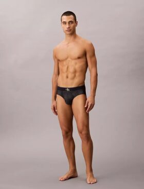 Slip taille basse en microfibre extensible avec motif Monogram Slip taille basse en microfibre extensible avec motif Monogram