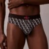 Slip taille basse en microfibre extensible avec motif Monogram Slip taille basse en microfibre extensible avec motif Monogram