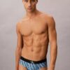 Slip taille basse en microfibre extensible avec motif Monogram Slip taille basse en microfibre extensible avec motif Monogram