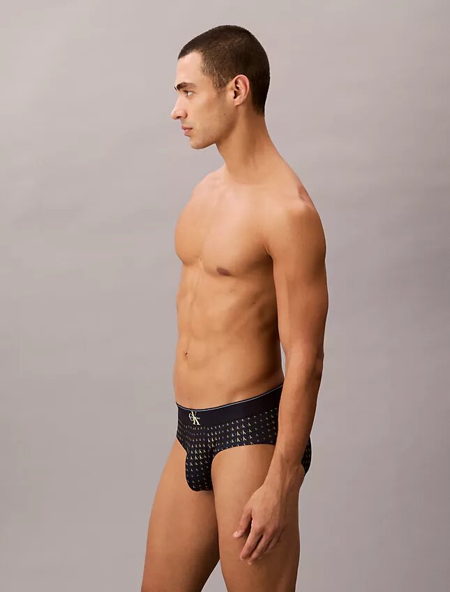Slip taille basse en microfibre extensible avec motif Monogram Slip taille basse en microfibre extensible avec motif Monogram