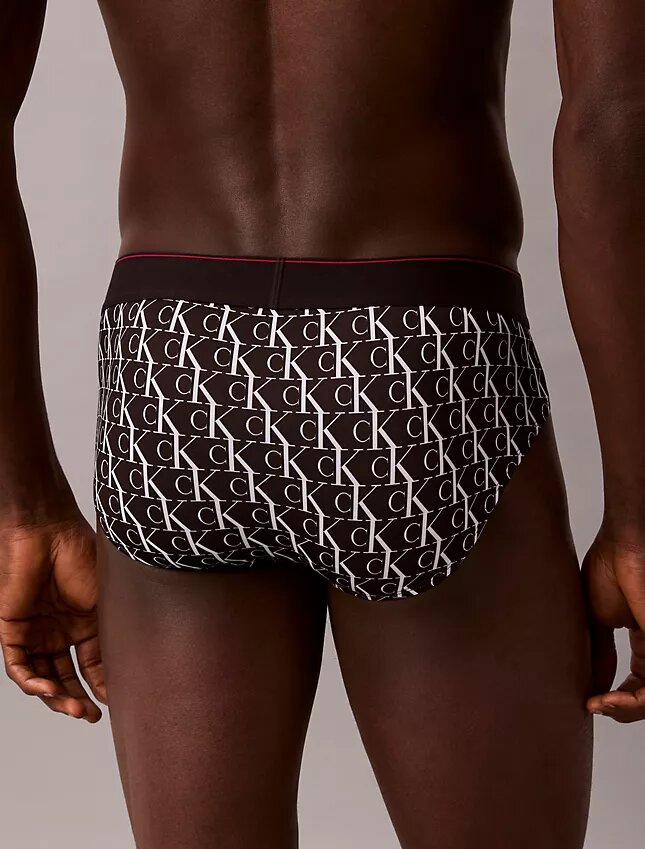 Slip taille basse en microfibre extensible avec motif Monogram Slip taille basse en microfibre extensible avec motif Monogram