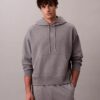 Sweat à capuche en tissu éponge avec logo emblématique Sweat à capuche en tissu éponge avec logo emblématique