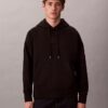 Sweat à capuche en tissu éponge avec logo emblématique Sweat à capuche en tissu éponge avec logo emblématique
