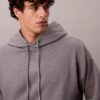Sweat à capuche en tissu éponge avec logo emblématique Sweat à capuche en tissu éponge avec logo emblématique