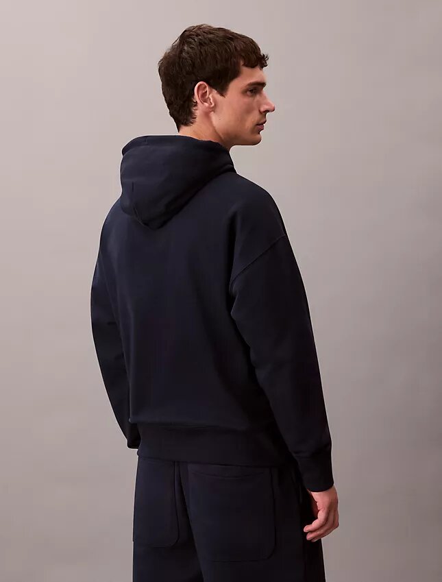 Sweat à capuche en tissu éponge avec logo emblématique Sweat à capuche en tissu éponge avec logo emblématique
