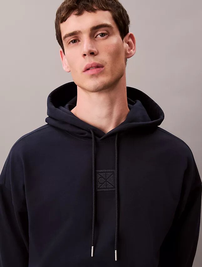 Sweat à capuche en tissu éponge avec logo emblématique Sweat à capuche en tissu éponge avec logo emblématique