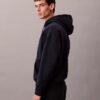 Sweat à capuche en tissu éponge avec logo emblématique Sweat à capuche en tissu éponge avec logo emblématique