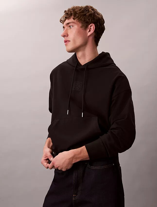 Sweat à capuche en tissu éponge avec logo emblématique Sweat à capuche en tissu éponge avec logo emblématique