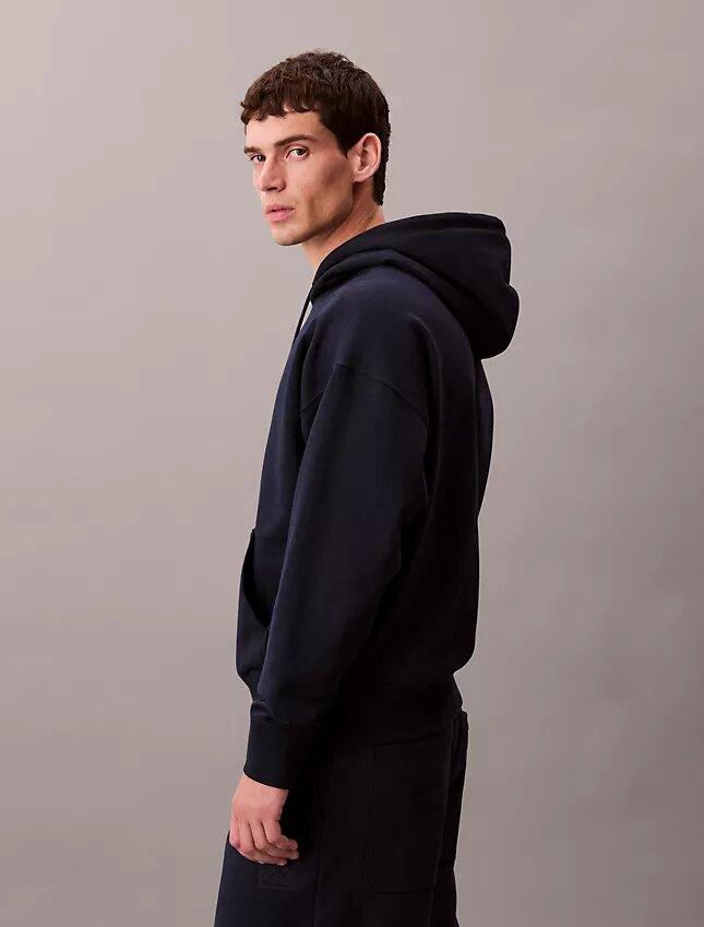 Sweat à capuche en tissu éponge avec logo emblématique Sweat à capuche en tissu éponge avec logo emblématique