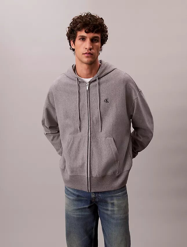 Sweat à capuche zippé ample en tissu éponge haut de gamme Sweat à capuche zippé ample en tissu éponge haut de gamme