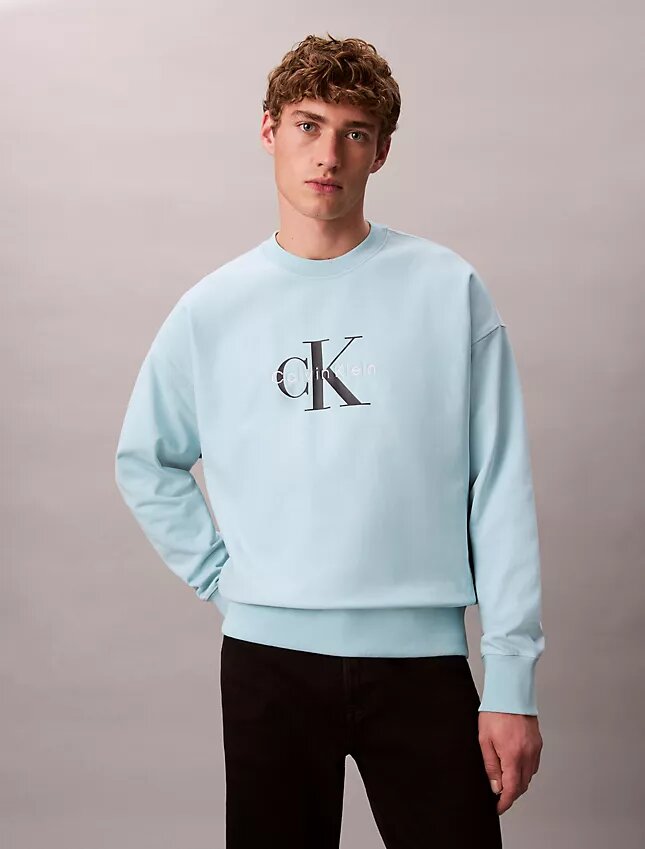 Sweat-shirt ample en tissu éponge haut de gamme avec logo Monogram Sweat-shirt ample en tissu éponge haut de gamme avec logo Monogram