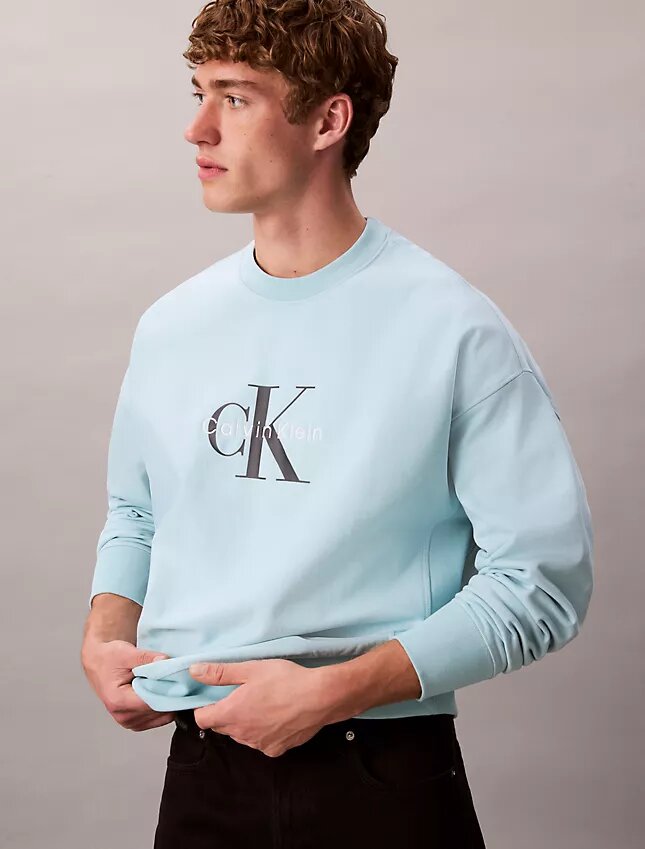 Sweat-shirt ample en tissu éponge haut de gamme avec logo Monogram Sweat-shirt ample en tissu éponge haut de gamme avec logo Monogram
