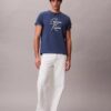 T-shirt ample avec logo en lettres cursives T-shirt ample avec logo en lettres cursives