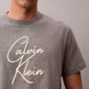 T-shirt ample avec logo en lettres cursives T-shirt ample avec logo en lettres cursives