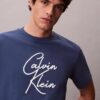 T-shirt ample avec logo en lettres cursives T-shirt ample avec logo en lettres cursives