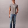 T-shirt ample avec logo en lettres cursives T-shirt ample avec logo en lettres cursives