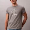 T-shirt ample avec logo en lettres cursives T-shirt ample avec logo en lettres cursives