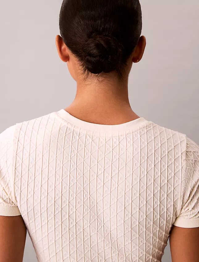 T-shirt sans coutures à emblème côtelé T-shirt sans coutures à emblème côtelé
