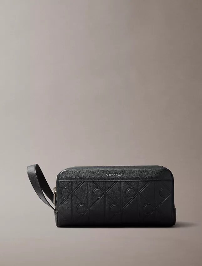 Trousse de toilette avec logo en relief Trousse de toilette avec logo en relief
