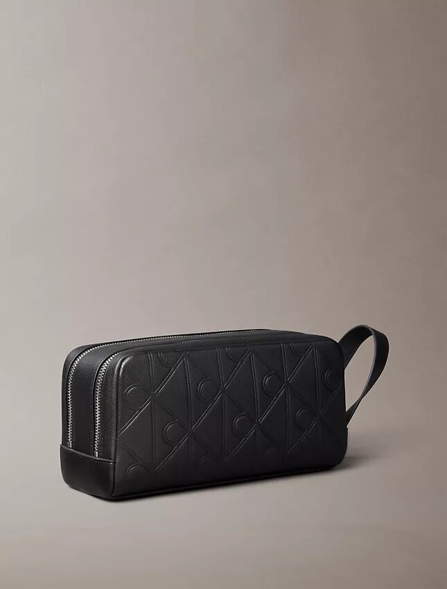 Trousse de toilette avec logo en relief Trousse de toilette avec logo en relief