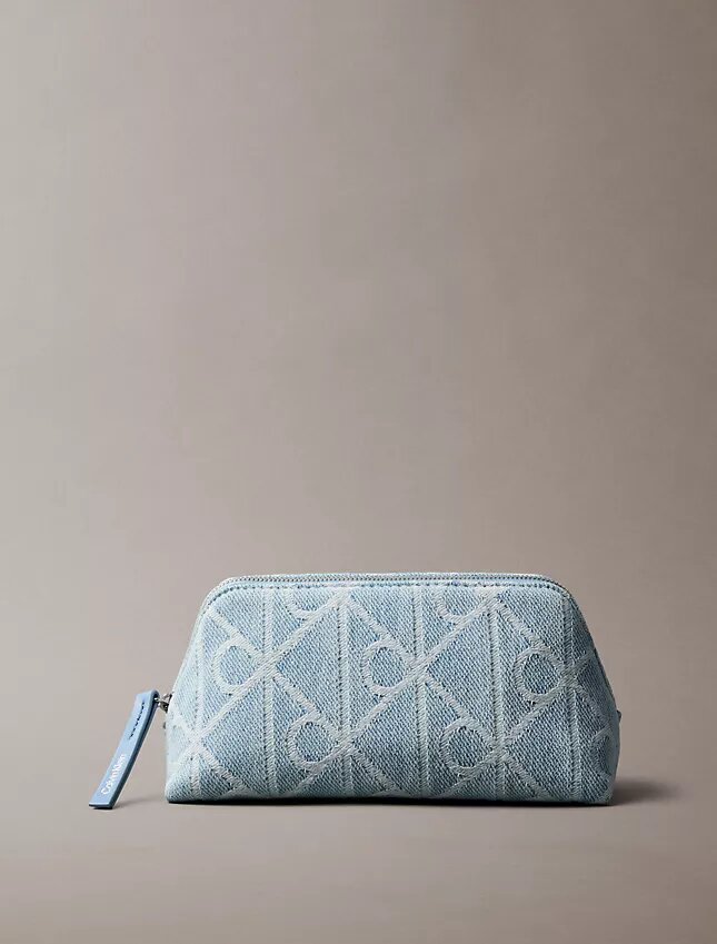 Trousse de toilette en Denim avec logo emblématique sur toute la surface Trousse de toilette en Denim avec logo emblématique sur toute la surface