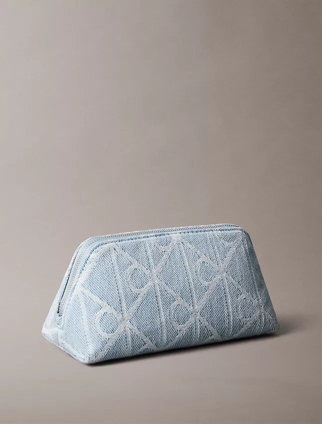 Trousse de toilette en Denim avec logo emblématique sur toute la surface Trousse de toilette en Denim avec logo emblématique sur toute la surface