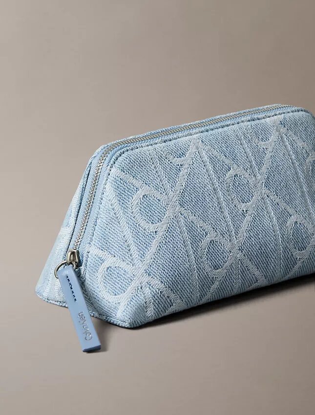 Trousse de toilette en Denim avec logo emblématique sur toute la surface Trousse de toilette en Denim avec logo emblématique sur toute la surface