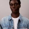 Trucker Jacket en denim des années 90 avec monogramme intégral Trucker Jacket en denim des années 90 avec monogramme intégral