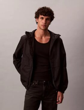 Veste coupe-vent avec logo emblématique sur toute la surface