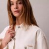 Veste en denim cintrée avec ceinture