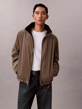 Veste réversible avec logo emblématique sur toute la surface