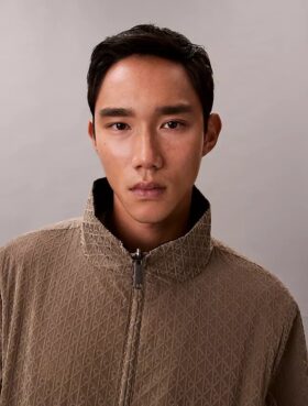 Veste réversible avec logo emblématique sur toute la surface